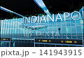 Airlane landing at Indianapolis, USA. Arrival in the city with reflection of airport and aircraft 141943915