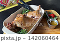 Inside a Perfectly Roasted Duck Revealing Tender Juicy Meat and Rich Texture After Cutting 142060464