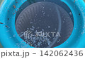 Pool skimmer net cleaning water surface 142062436