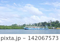 Blue Car Ferry Boat Carrying Vehicles Sailing Across Sea Channel in Krabi 142067573