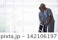 Asian senior older adult couple husband wife physical rehabilitation walking practice together 142106197