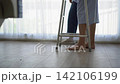 Asian senior older adult couple husband wife physical rehabilitation walking practice together 142106199