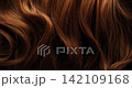 Ultra slow motion shot of dark brown hair flowing in smooth, elegant waves, forming natural curves and motion. Captured at 1000 fps, revealing fine texture, shine, and fluid cinematic movement. Ultra slow motion shot of dark brown hair flowing in smooth, elegant waves, forming natural curves and motion. Captured at 1000 fps, revealing fine texture, shine, and fluid cinematic movement. 142109168