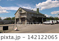 Solar panels installed on the roof of a city building. Concept of eco friendly and alternative power source.  142122065