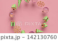 Rotating decorations for Christmas, New Year. Round frame with copy space, red color. Seamless looped 4k animation. 142130760