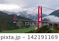 Aerial View of Xingkang Suspension Bridge over Dadu River in Sichuan China 142191169