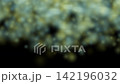 Dust particles dispersing through a soft blurred background 142196032