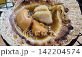 April 30 2026 Fresh scallops grilled in shells with soy sauce. 142204574