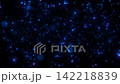 Luminescent blue bokeh particles rising gracefully in dark space, creating a magical ambient background overlay. 142218839