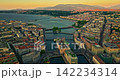 Establishing shot of Geneva city. Aerial view of the Swiss lake town. Rooftops of houses and the lake bay 142234314