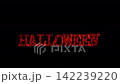 fiery Halloween text with a sudden scary bloody handprint on a solid black background 142239220
