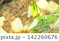 Steaming hot sukiyaki: A Japanese hot pot dish of beef and vegetables simmered together. 142260676