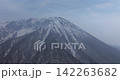 Drone aerial photography circling near the summit of Mt. Daisen in spring. 142263682