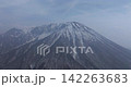 Drone aerial photography circling near the summit of Mt. Daisen in spring. 142263683