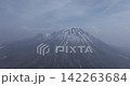 Drone aerial photography circling near the summit of Mt. Daisen in spring. 142263684