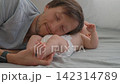 Father listening to his three month old baby son's belly. Slow motion. 142314789