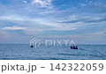 Small boat at sea 142322059