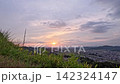 A time-lapse of the sunset, a beautiful sunset seen from the top of a hill. 142324147