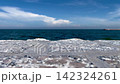 Empty wooden table the blurred ocean beach background, product display 142324261