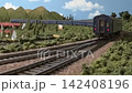 An old-style passenger express train runs on a model railway layout. 142408196