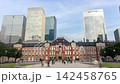 A hyperlapse of Tokyo Station's red brick building and the Marunouchi office district in Japan. 142458765