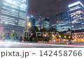 Time-lapse of Tokyo Station's Marunouchi Exit and skyscrapers at night, Japan 142458766