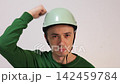 Military soldier saluting and showing threatening fist 142459784