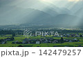 The rural landscape of Azumino and the curtain of sunlight pouring down [Ikeda Town, Kitaazumi District] 142479257