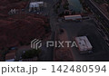 Aerial sunrise over St. George city and red rock cliffs in Utah 142480594