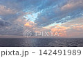 Live-action video footage available for commercial use, showing a dynamic sky over the ocean with beautiful sunrise light and cloud formations. Live-action video footage available for commercial use, showing a dynamic sky over the ocean with beautiful sunrise light and cloud formations. 142491989