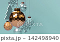 Christmas rotating hanging balls and snowflakes on blue background. New Year decorative elements. Seamless looped 4k animation. 142498940