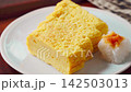 Japanese-style egg dish: Rolled omelet with dashi broth, served with grated daikon radish. Japanese-style egg dish: Rolled omelet with dashi broth, served with grated daikon radish. 142503013