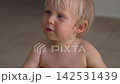 Boy with red rash spots on face and body. Close-up. Slow motion. 142531439
