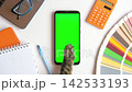 Cat Fur Paw touching, clicking, tapping and swiping on mobile phone with chromakey screen. Zoom in out. Close up Gestures Pack. Cat Using Smartphone Green Screen Mock Up Display On Work Desk Top view 142533193