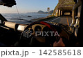 Driving along the Golden Road at sunrise 142585618