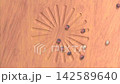 3DCG video of a wooden ball in linear motion that appears to be rotating, viewed from directly above, looped from frame 141 to 240. 142589640