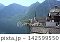 Nature Hallstatt Village on water Lake Alpine Mountains and water waves in Austria. Old Church 142599550