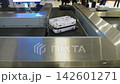 Close up of luggage being moved around an airport, colorful suitcases, 4k 142601271
