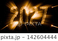 Golden 2027 numbers glow with starburst light in seamless loop 142604444