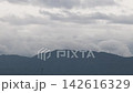 Mountains and rain clouds 142616329