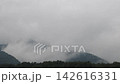 Mountains and rain clouds 142616331