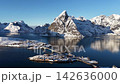 Aerial view of fishing village in winter landscape, Norway 142636000