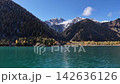 Scenic aerial view of mountain Issyk's lake with snow-capped peaks, Kazakhstan 142636126