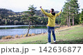 Joyful moments by the lake, celebrating nature's beauty in the great outdoors 142636877