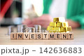 Exploring the world of investment through gold and silver at a modern workspace 142636883
