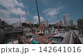 Cranes at urban construction sites Cranes at urban construction sites 142641016