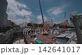 Cranes at urban construction sites Cranes at urban construction sites 142641017