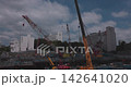 Cranes at urban construction sites Cranes at urban construction sites 142641020