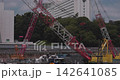 Cranes at urban construction sites Cranes at urban construction sites 142641085