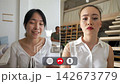 Students share thoughts on learning during online class discussion 142673779